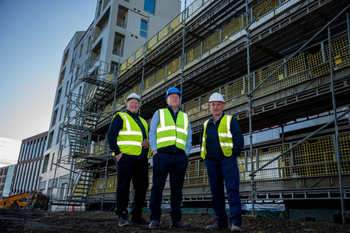 Deeside Timberframe and Falcon Fox Developments team members in hi-vis and hard hats on site at the Vaux Housing Phase II development in Sunderland